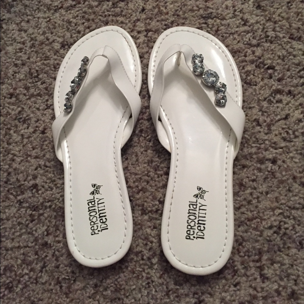 White jeweled flip flops